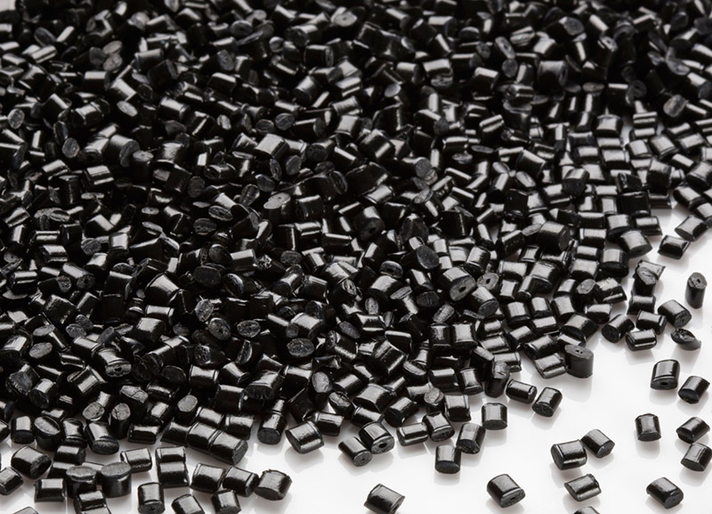 Black masterbatch scattered on a table